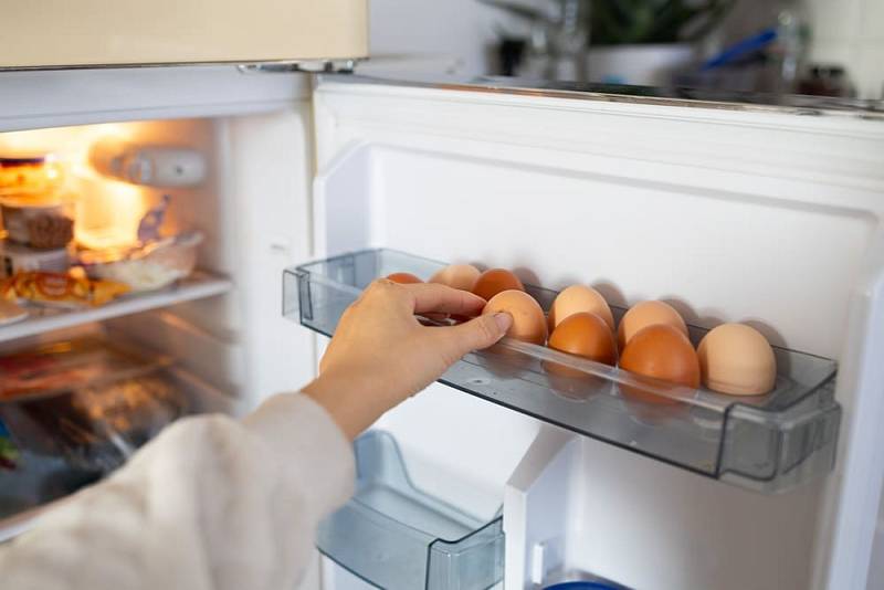 Woman,Hands,Take,Chicken,Eggs,From,The,Fridge.
