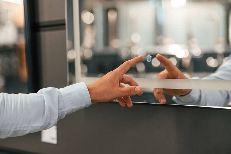 Close,Up,View,,Touching,Smart,Mirror.,Man,Is,In,The