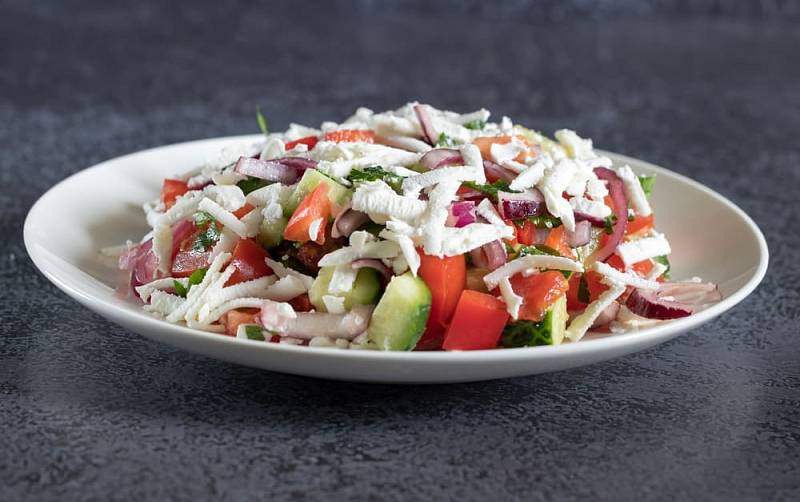 Bulgarian,Shopska,Salad,With,Vegetables,And,Brynza,On,Dark,Background