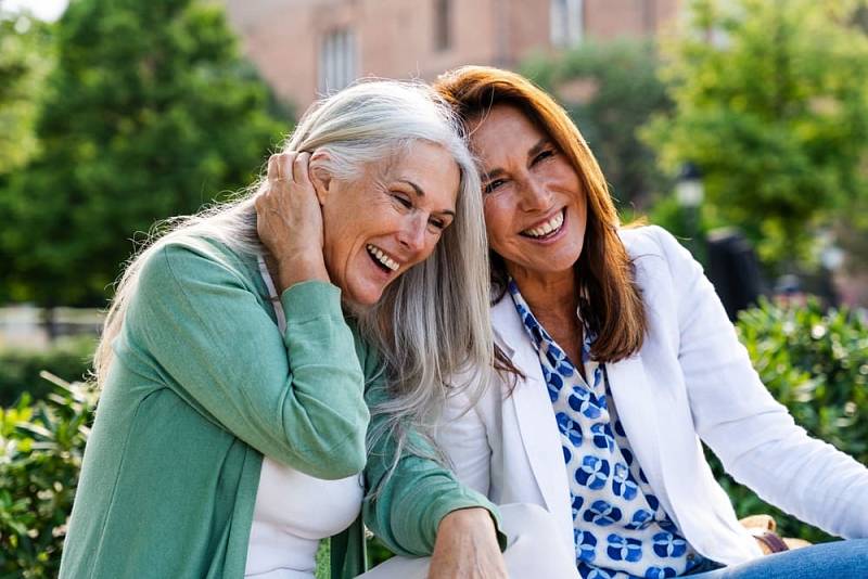 Beautiful,Senior,Women,Bonding,Outdoors,In,The,City,-,Attractive